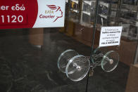 <p>A padlock and chain hang across the entrance doors to a closed Hellenic Post SA post office during a 24-hour labour strike in Athens, Greece, on Wednesday, May 17, 2017. Greeces economy returned to recession in the first quarter as delays in concluding talks between the government and its creditors raised the specter of another debt drama. (Yorgos Karahalis/Bloomberg via Getty Images) </p>