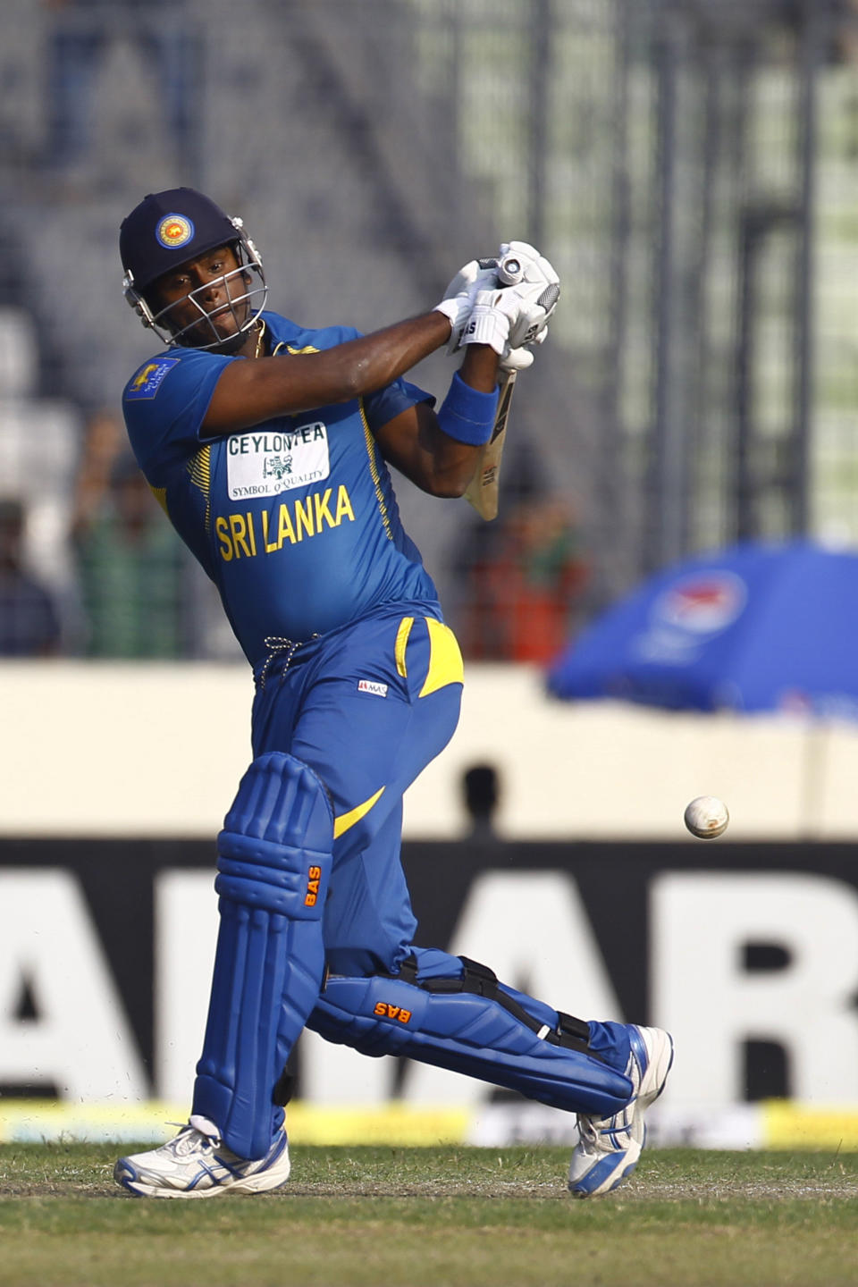 Sri Lanka’s Angelo Mathews plays a shot during the second one day international (ODI) cricket match against Bangladesh in Dhaka, Bangladesh, Thursday, Feb. 20, 2014. (AP Photo/A.M. Ahad)