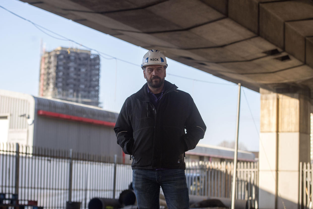 EMBARGOED TO 1200 MONDAY MARCH 26 BBC's DIY SOS Nick Knowles on the site of a brand new multi-use community space and gym that his team are building for the Grenfell community on a site underneath the A40.