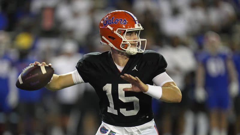 Florida quarterback Graham Mertz looks for a receiver during the second half of the NCAA college football team’s annual Orange and Blue spring game, April 13, 2023, in Gainesville, Fla.