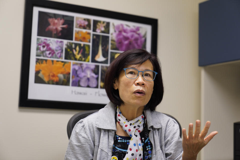 Nikie Phung, a public health assistant, talks about her experiences as a refugee from Vietnam, at the Valley Health Center TB/Refugee Program in San Jose, Calif., on Dec. 9, 2021. The staff of Silicon Valley's decades-old refugee health clinic may not all speak the language of the Afghan refugees starting new lives in the San Francisco Bay Area. But they know the anxiety and stress of newcomers who fled war and chaos to end up in a country where they don't speak the language and everything is different. (AP Photo/Eric Risberg)