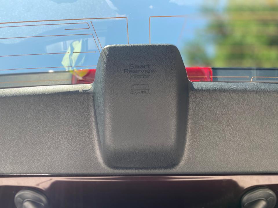 The Subaru Ascent's Smart Rearview Mirror camera is mounted to the top of the rear windshield.
