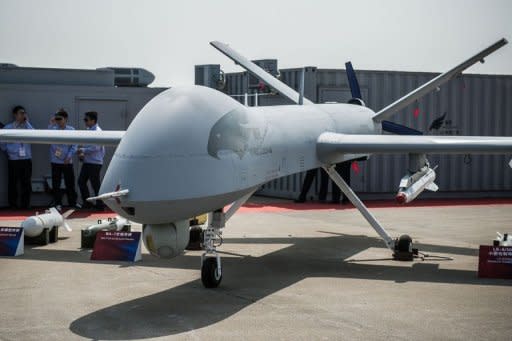 The "Yi Long" drone by China Aviation Industry Corporation (AVIC) is displayed during the 9th China International Aviation and Aerospace Exhibition in Zhuhai. China on Tuesday showed off a new military drone and a model of a next-generation fighter plane as it builds up its own defence capabilities and seeks customers for its hardware