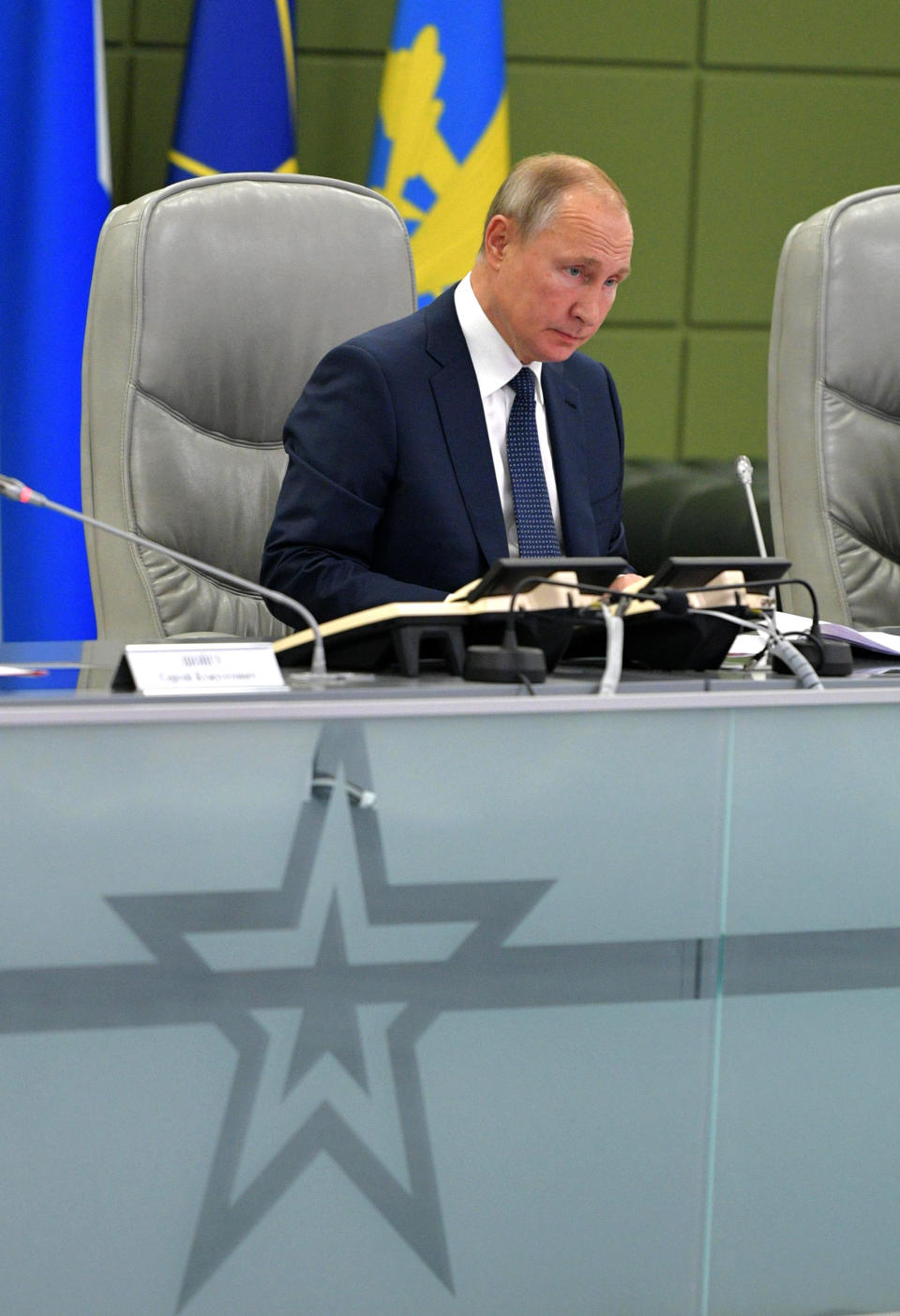 Russian President Vladimir Putin attends a meeting at the Russian Defense Ministry in Moscow, Russia, Thursday, Oct. 17, 2019. (Alexei Druzhinin, Sputnik, Kremlin Pool Photo via AP)