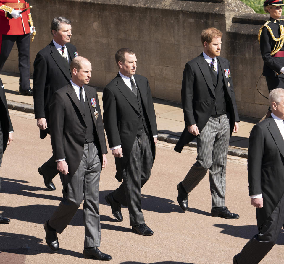 Image: Prince William, Peter Phillips, Prince Harry, and Vice-Admiral Sir Timothy Laurence follow Prince Philip's coffin as it arrives at St. George's Chapel. (Paul Edwards / WPA Pool via Getty Images)