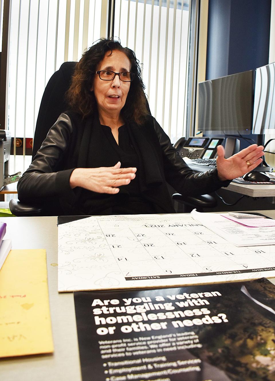 Fall River veteran's agent Michelle Hamilton sits at her desk in 2023.