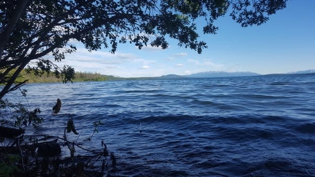 Two people were rescued by RCMP and Yukon Search and Rescue after their sailboat capsized on Marsh Lake last Monday. (Paul Tukker/CBC - image credit)