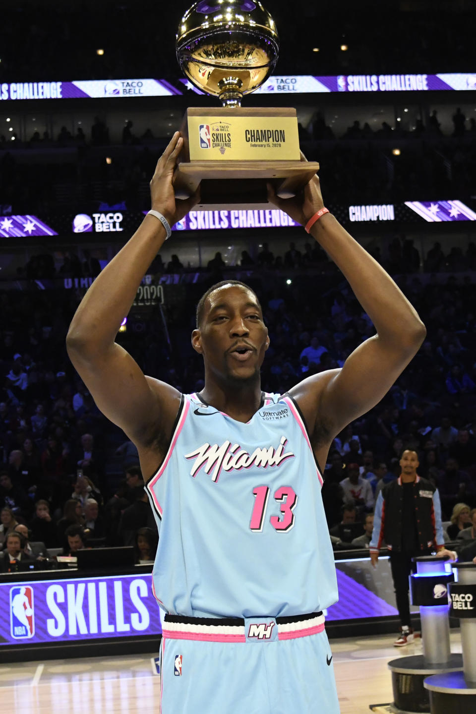 Miami Heat's Bam Adebayo holds the trophy after winning NBA basketball's All-Star skills challenge Saturday, Feb. 15, 2020, in Chicago. (AP Photo/David Banks)