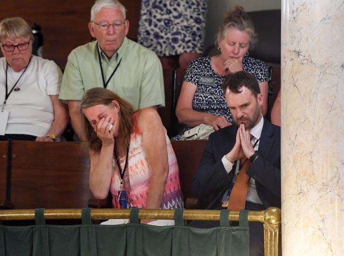 Jenny Boever, widow of the deceased Joe Boever, cries as the senate vote passes to impeach and remove Attorney General Jason Ravnsborg from office on Tuesday, June 21, 2022, at the South Dakota State Capitol in Pierre.