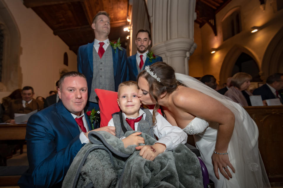 Henry Matthews and Hannah Cowlishaw with Ethan Martin, 8. [Photo: SWNS]