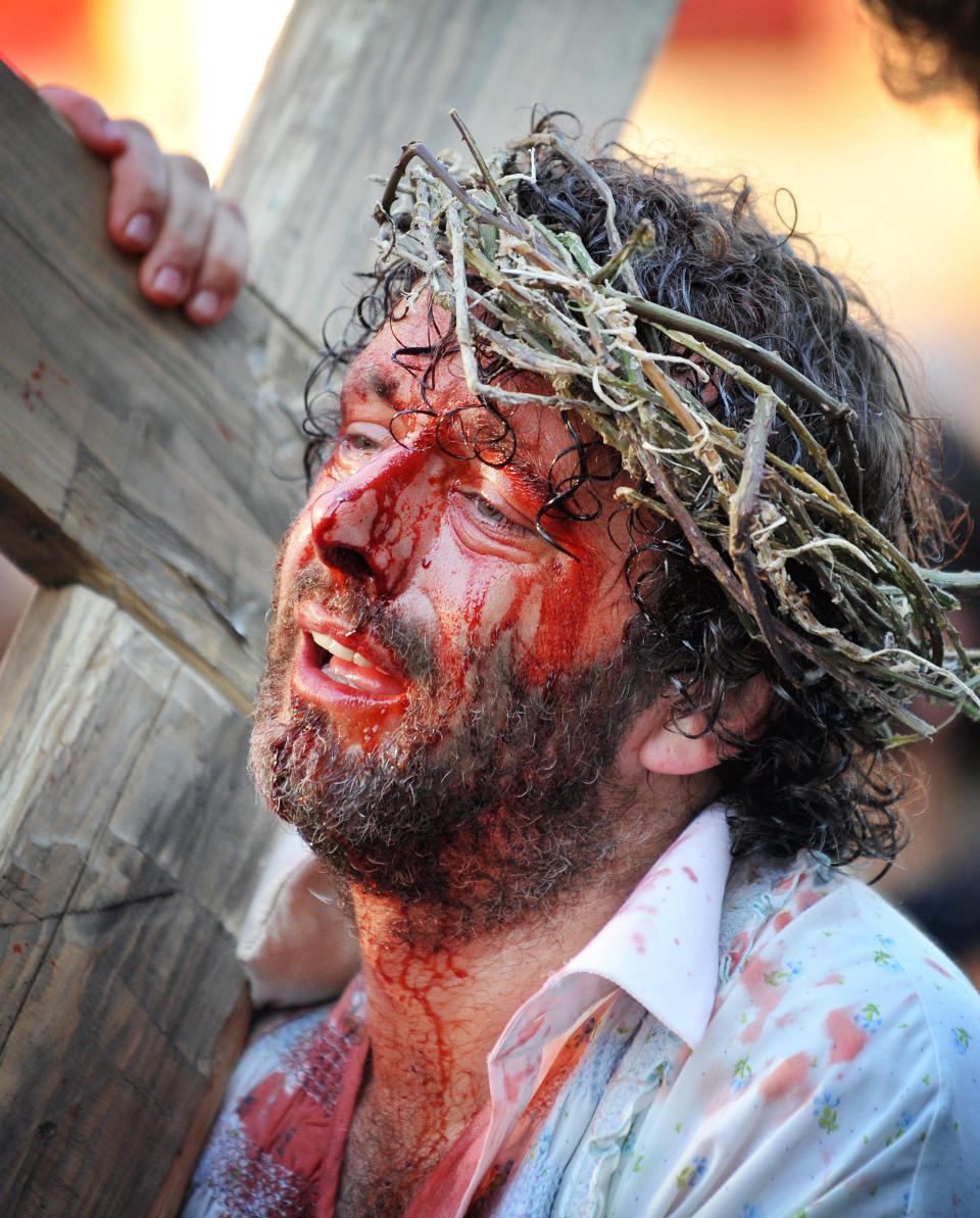 Actor Martin Sheen in a procession, starring in day three of the Passion play taking place across his hometown of Port Talbot.