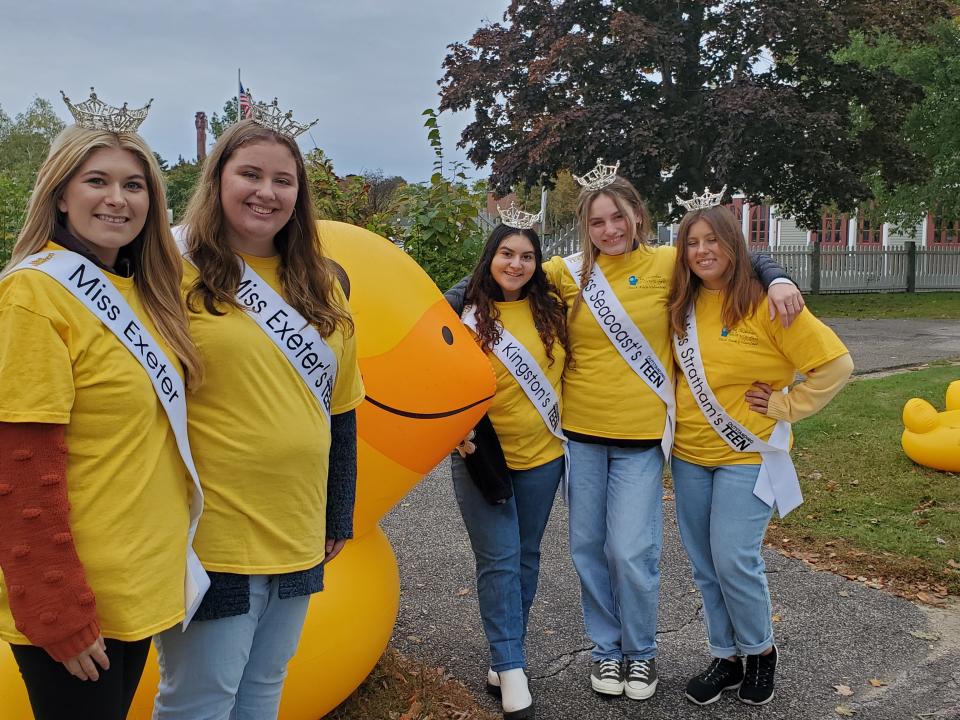 Madison Hawkes, Miss Exeter; Abigail Bone, Miss Exeter Outstanding Teen; Clara Nasci, Miss Kingston Outstanding Teen; Vanessa Frasca, Miss Seacoast Outstanding Teen, and Mary Varney, Miss Stratham Outstanding Teen help with the Duck Race during Exeter's Powder Keg Beer and Chili Festival Saturday, Oct. 1, 2022.