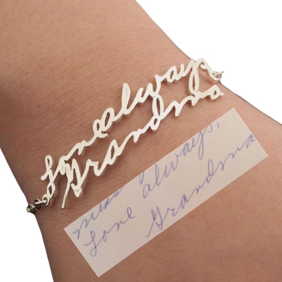 <p><a href="https://www.amazon.com/Handwriting-Bracelet-Signature-Memorial-Personalized/dp/B07J9HJJFD?tag=syn-yahoo-20&ascsubtag=%5Bartid%7C10050.g.4767%5Bsrc%7Cyahoo-us" rel="nofollow noopener" target="_blank" data-ylk="slk:Shop Now;elm:context_link;itc:0;sec:content-canvas" class="link ">Shop Now</a></p><p>Handwriting Bracelet</p><p>Amazon</p><p>$25.90</p>