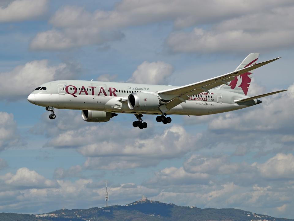 Qatar airways plane flying