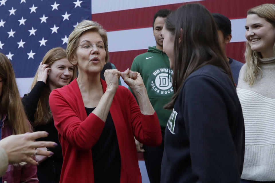 FILE - In this Oct. 24, 2019, file photo, Democratic presidential candidate Sen. Elizabeth Warren, D-Mass., speaks to young people at a campaign event at Dartmouth College in Hanover, N.H. For Warren, it was supposed to be another big idea in a campaign full of them: A promise that everyone could get government-funded health care, following the lead of her friend and fellow White House hopeful Bernie Sanders. (AP Photo/Elise Amendola)