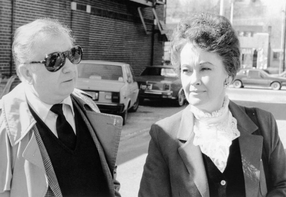 (Original Caption) Ed and Lorraine Warren arrives at Danbury Superior Court, March 19, 1981, where a grand jury returned an indictment against Arne Cheyenne Johnson in the slaying of Alan Bono, 40, on February 16, 1981, in Broofield, Connecticut. Lorraine Warren was one of the persons to talk with the 19 year old man after the slaying which his attorney says was the work of the devil.