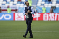 <p>Gareth Southgate ponders his options before the match in the Kalingrad Arena </p>