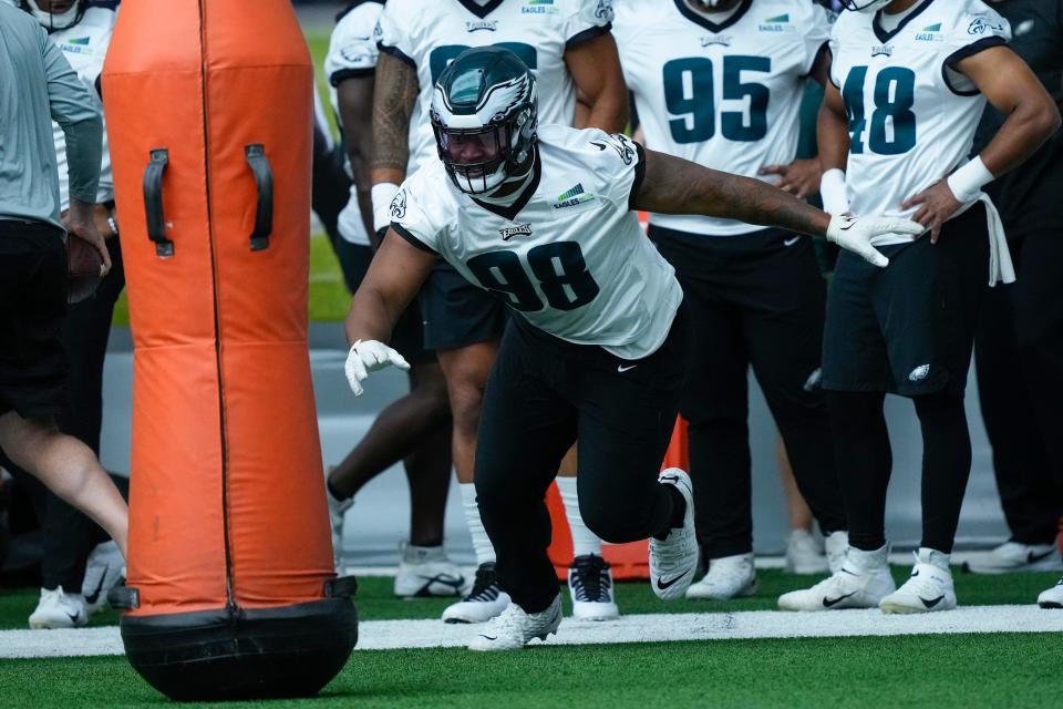 Philadelphia Eagles' Jalen Carter runs a drill during practice at the NFL football team's training facility in June.