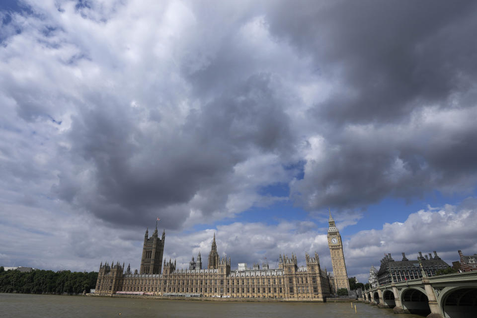 Dark clouds appear over the Elizabeth Tower, known as Big Ben, beside the Houses of Parliament in London, Friday, June 24, 2022. British Prime Minister Boris Johnson suffered a double blow as voters rejected his Conservative Party in two special elections dominated by questions about his leadership and ethics. He was further wounded when the party's chairman quit after the results came out early Friday, saying Conservatives “cannot carry on with business as usual.” (AP Photo/Frank Augstein)