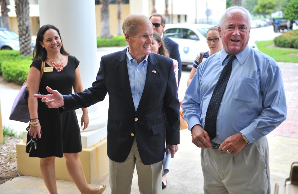 Indian River County Commissioner Peter O'Bryan (right) greets U.S. Sen Bill Nelson, D-Florida, July 25, 2014, outside the Indian River County Administration Building in Vero Beach. Nelson was in town to speak to Indian River Lagoon Counties Collaborative members from Volusia, Brevard, Indian River, St. Lucie and Martin counties O'Bryan opted not to run again in 2022 after serving as a county commissioner for 16 years.