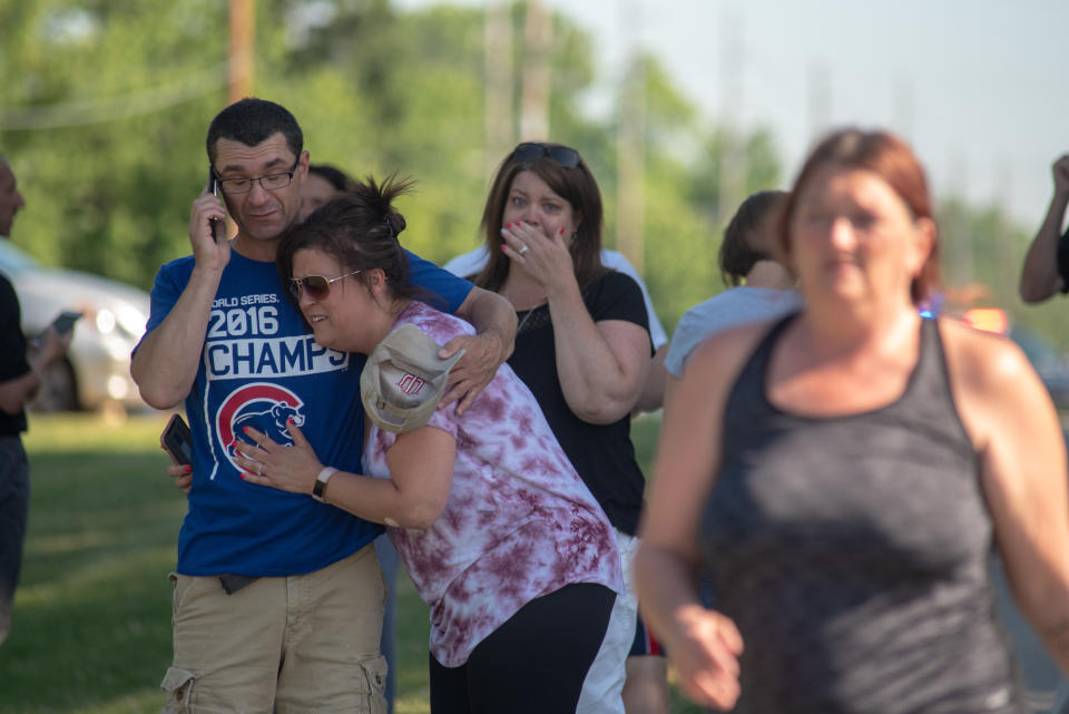 <p>Parents comfort each other as they wait outside Noblesville West Middle School after a shooting at the school on May 25, 2018 in Noblesville, Ind. (Photo: Kevin Moloney/Getty Images) </p>