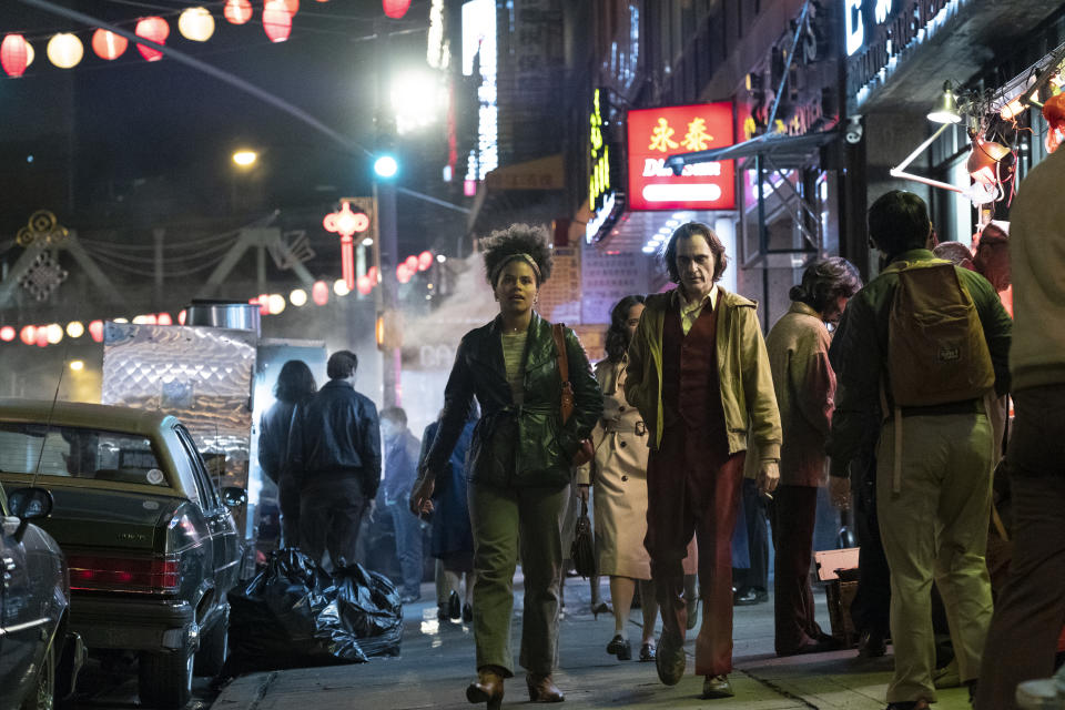 Zazie Beetz as Sophie Dumond and Joaquin Phoenix as Arthur Fleck in 'Joker.' | Niko Tavernise