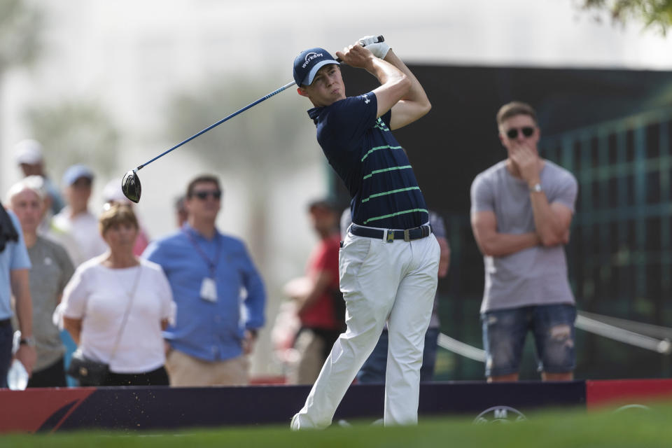 Matthew Fitzpatrick of England tees off on the 6th hole during round one of the Dubai Desert Classic golf tournament, in Dubai, United Arab Emirates, Thursday, Jan. 24, 2019. (AP Photo/Neville Hopwood)