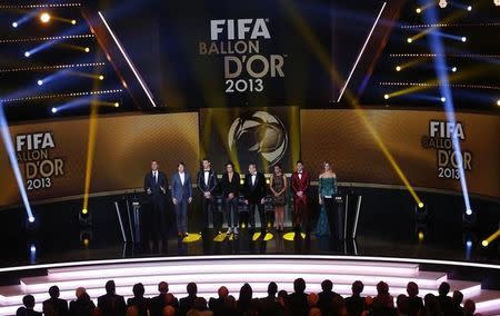 The nominees for the Women's and Men's World Soccer Player of the Year 2013 Award stand on stage at the FIFA Ballon d'Or ceremony in Zurich January 13, 2014. REUTERS/Arnd Wiegmann