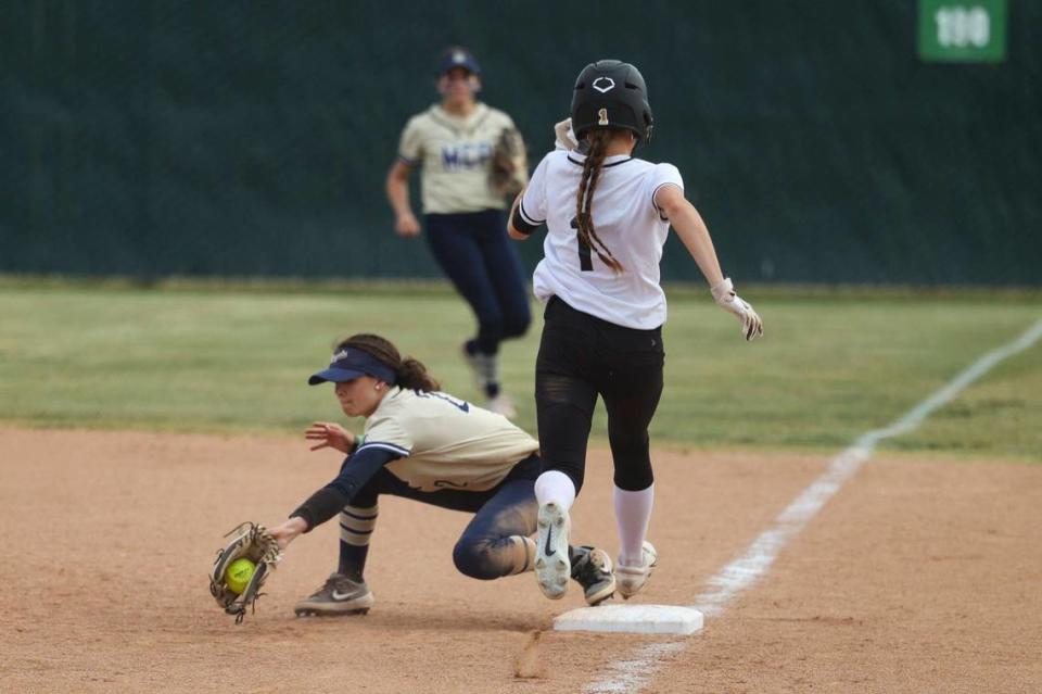 Mikaylee Gordon covered first on a bunt attempt by Catlin Shaw. Mission Prep won 7-0 over San Luis Obispo High School in a softball playoff on May 15, 2024.
