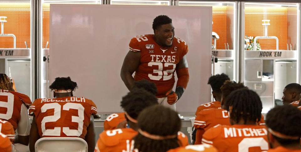 Texas Longhorns defensive lineman Malcolm Roach #32 speaks to teammates during halftime in the locker room Saturday Sept. 7, 2019 at Darrell K Royal-Texas Memorial Stadium in Austin, Tx. ( Photo by Edward A. Ornelas )