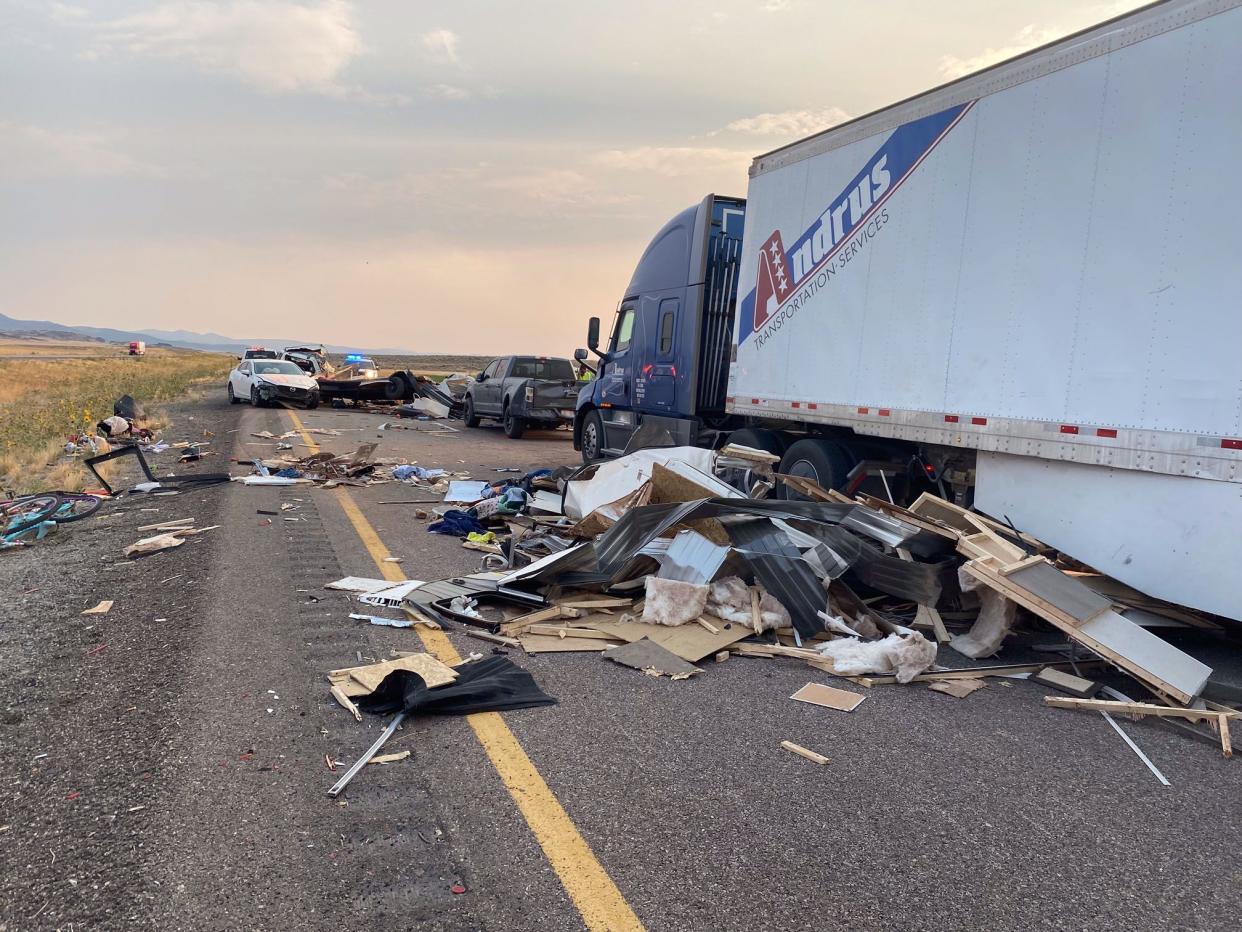 This photo provided by the Utah Highway Patrol and posted on the Utah Department of Public Safety website shows the scene of a fatal pileup, Sunday, July 25, 2021, on Interstate 15 in Millard County, near the town of Kanosh, Utah. 