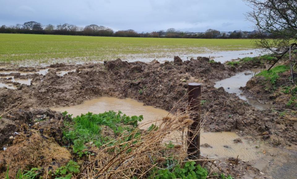 Isle of Wight County Press: Large ditch at the gate of the field and ditches filled with water leading to Forest Hill