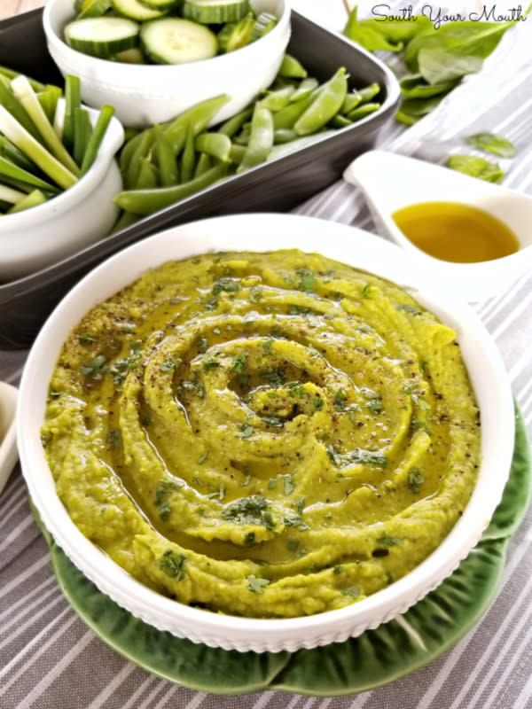 <p>South Your Mouth</p><p>A super smooth hummus dip made with green peas and spinach.</p><p><strong>Get the recipe: <a href="https://www.southyourmouth.com/2018/01/green-goddess-hummus.html" rel="nofollow noopener" target="_blank" data-ylk="slk:Green Goddess Hummus;elm:context_link;itc:0;sec:content-canvas" class="link rapid-noclick-resp">Green Goddess Hummus</a></strong></p>
