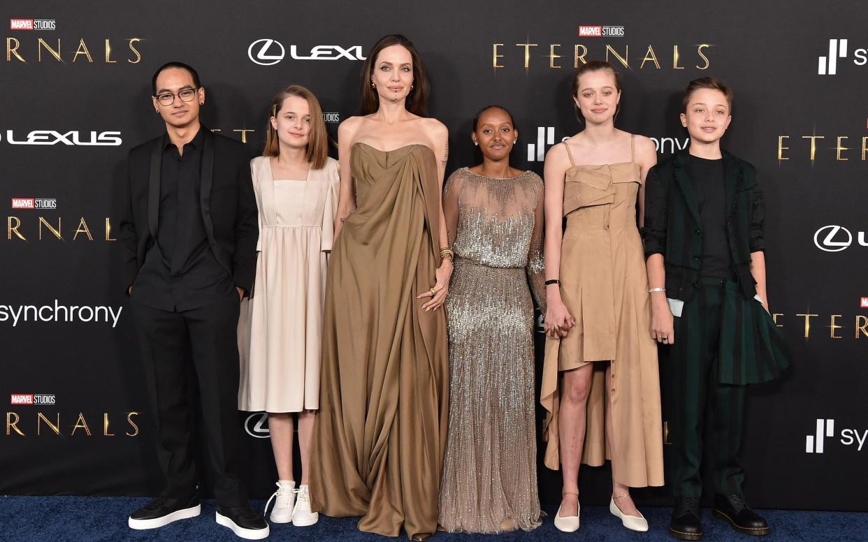 Angelina Jolie at the Eternals premiere in Los Angeles on Monday with her children (from left) Maddox, Vivienne, Zahara, Shiloh and Knox - Axelle/Bauer-Griffin