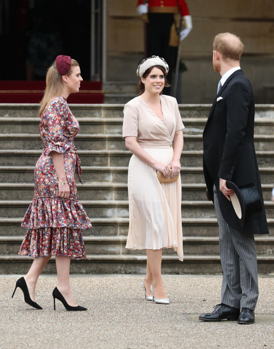 Princess Beatrice wearing The Vampire's Wife at the Queen's Garden Party in May 2019 [Photo via Getty Images]