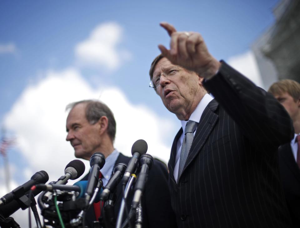 FILE - In this March 26, 2013 file photo, attorneys David Boies, left, and Theodore Olson, addresse members of the media outside the Supreme Court in Washington. Olson and Boies fought on opposite sides of the case that determined the 2000 presidential election, but the veteran attorneys joined forces to defeat California’s gay-marriage ban, a five-year effort documented in “The Case Against 8,” which premiered at the Sundance Film Festival. The film follows the attorneys and plaintiffs in the lawsuit that resulted in the marriage ban being overturned. “The Case Against 8” is set to air on HBO in June. (AP Photo/Pablo Martinez Monsivais, File)