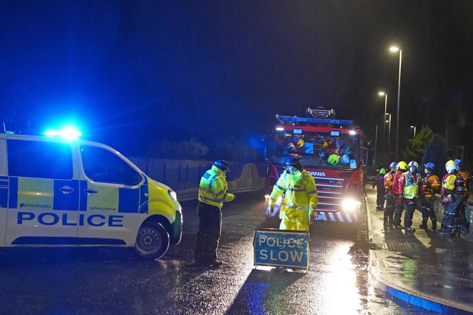 Police close River Street in Brechin as members of the fire service ask residents to evacuate due to flood warnings (Andrew Milligan/PA) (PA Wire)
