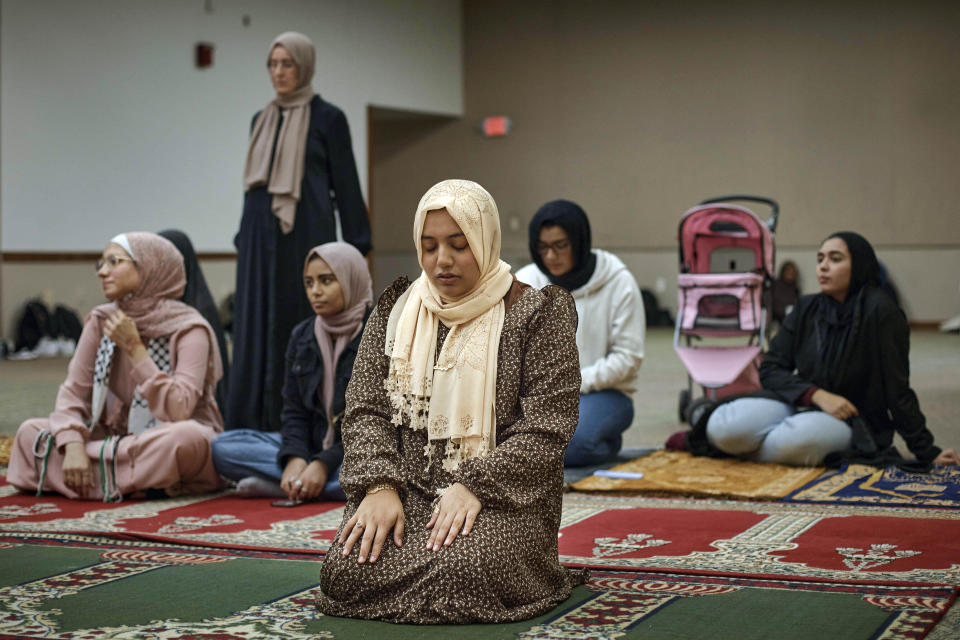 Muslim Rutgers University's students pray on Friday, Oct. 27, 2023, in New Brunswick, N.J. For many of the university chaplains and faith leaders caring for students angered and shaken by the Israel-Hamas war, the needs are acute, the days intense. The bloodshed has roiled campuses in the United States, sparking rival rallies and competing demands.(AP Photo/Andres Kudacki)