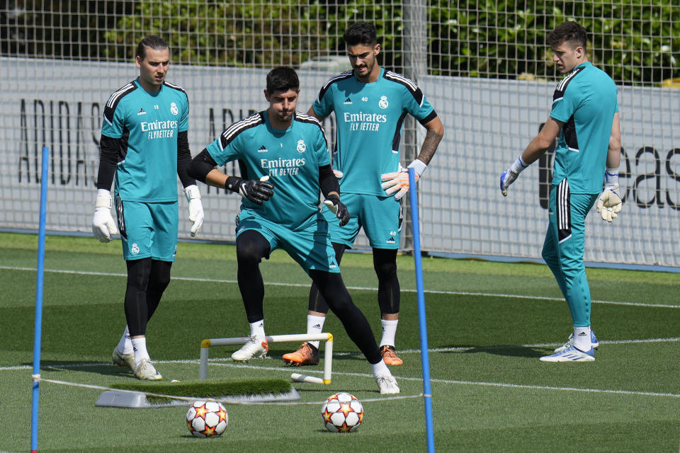 Real Madrid's goalkeeper Thibaut Courtois, 2nd left trains during a Media Opining day training session in Madrid, Spain, Tuesday, May 24, 2022. Real Madrid will play Liverpool in Saturday's Champions League soccer final in Paris. (AP Photo/Manu Fernandez)