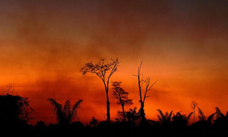 Smoke rises from a burnt area of land in Brazil’s Mato Grosso state last week.
