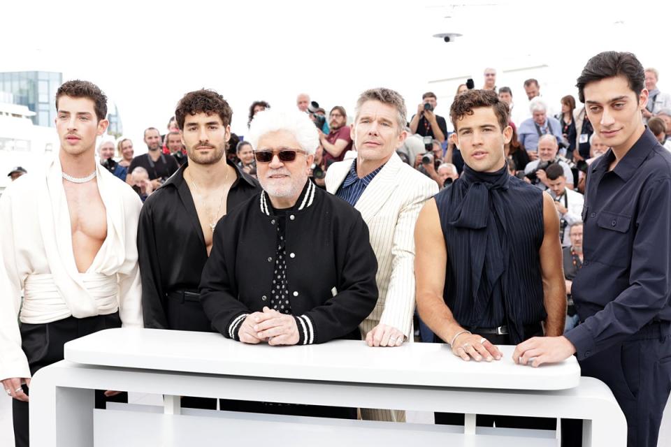 Almodóvar with members of the cast of Strange Way of Life (Getty Images)