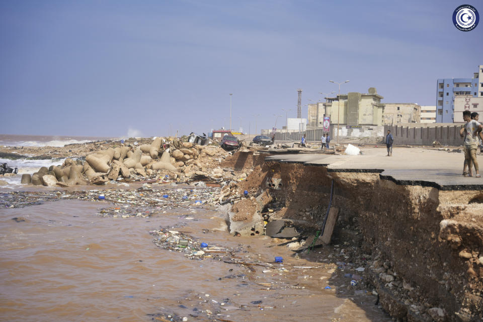 In this photo provided by the Libyan government, a seaside road is collapsed after heavy flooding in Derna, Libya, on Monday, Sept. 11, 2023. Mediterranean storm Daniel caused devastating floods in Libya that broke dams and swept away entire neighborhoods and wrecked homes in multiple coastal towns in the east of the North African nation. (Libyan government via AP)