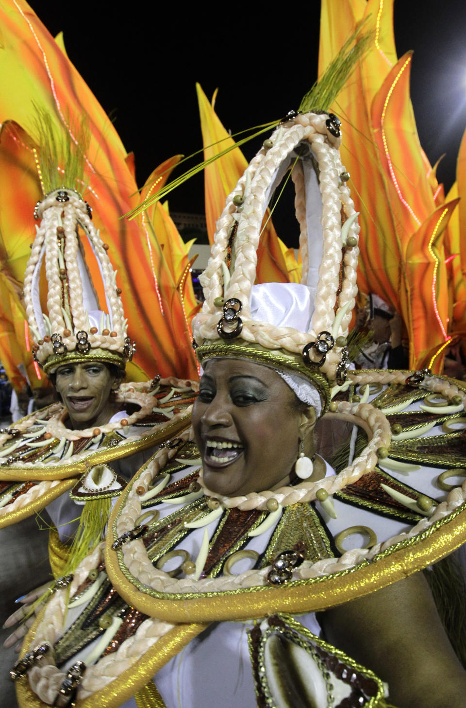 Performers from the Imperio da Tijuca samba school parade during carnival celebrations at the Sambadrome in Rio de Janeiro, Brazil, Sunday, March 2, 2014. (AP Photo/Silvia Izquierdo)