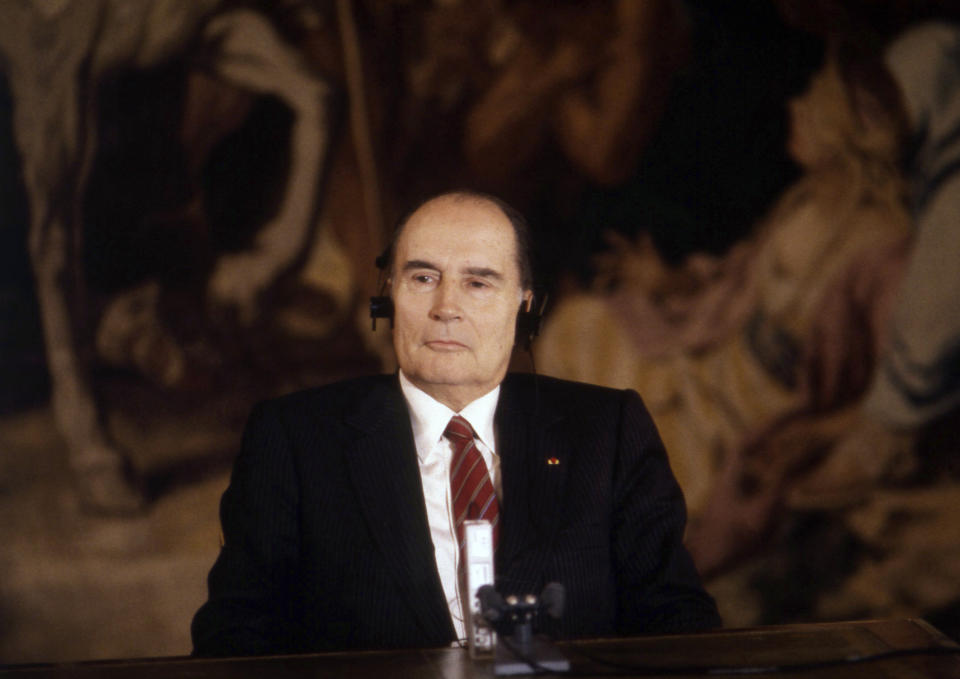 FILE - In this Oct. 16, 1984 file photo, French President Francois Mitterrand gives a joint press conference with the Hungarian Communist Party leader Janos Kadar at the Elysee Palace, Paris. A report commissioned by the Rwandan government due to be made public on Monday, April 19, 2021 concludes that the French government bears "significant" responsibility for "enabling a foreseeable genocide" that left more than 800,000 dead in 1994 and that that France "did nothing to stop" the massacres. (AP Photo/William Stevens, File)