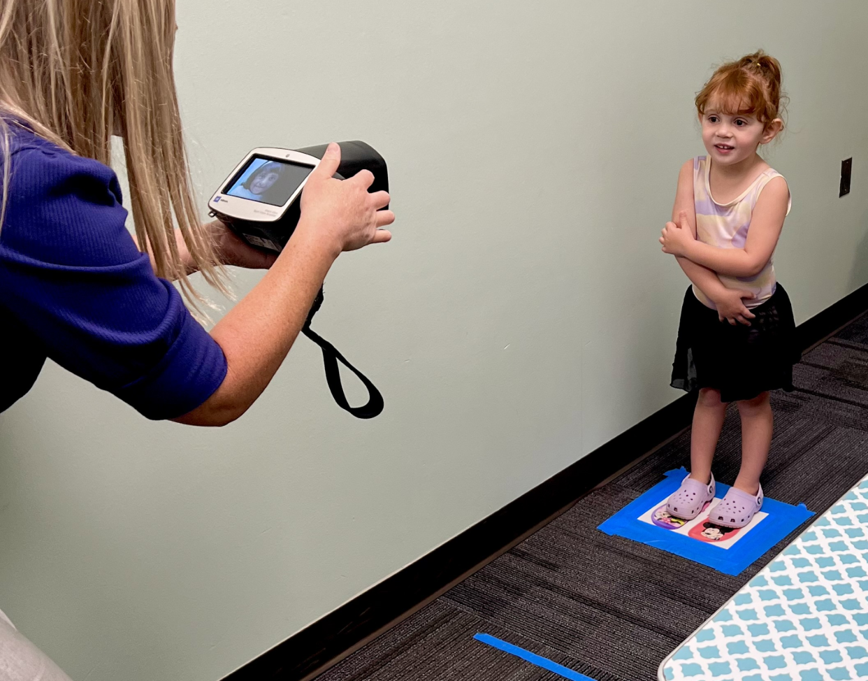 Vayda Spinale participates in hearing and vision screenings offered by tester Brooke Fender at the Monroe County Health Department. Appointments can now be made for screenings.