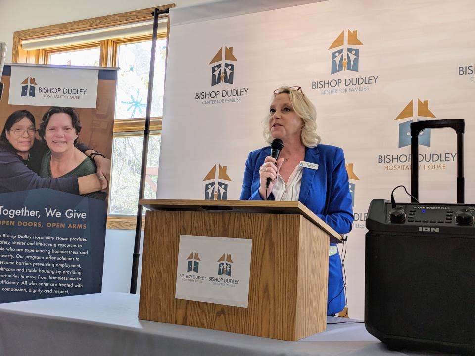 Madeline Shields, executive director at Bishop Dudley, speaks during the Bishop Dudley Center for Families open house April 19, 2024. She says she hopes they will have a large volunteer organization to help families get back to self sufficiency.