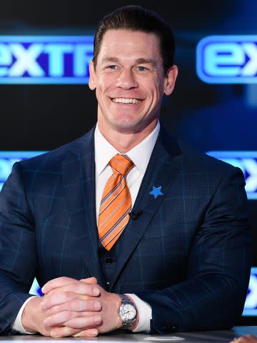 <p>Noel Vasquez/Getty</p> John Cena visits "Extra" at Burbank Studios on January 15, 2020.