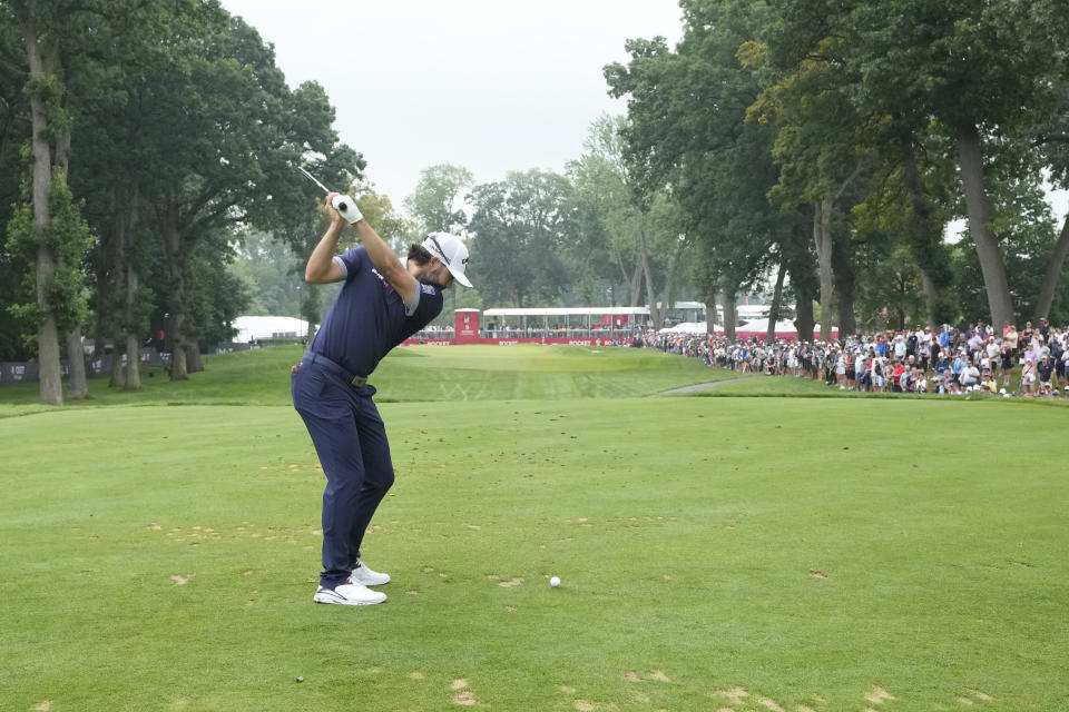 Adam Hadwin drives off the ninth tee during the final round of the Rocket Mortgage Classic golf tournament at Detroit Country Club, Sunday, July 2, 2023, in Detroit. (AP Photo/Carlos Osorio)