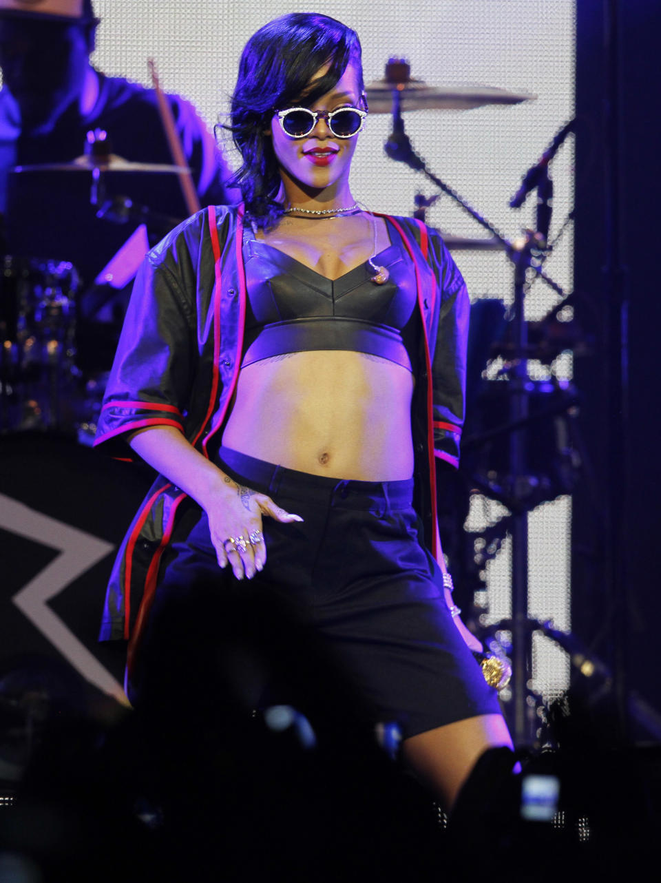 Barbadian singer Rihanna performs during the first stop of her 777 worldwide tour at the Plaza Condesa in Mexico City, Wednesday, Nov. 14, 2012. (AP Photo/Marco Ugarte)