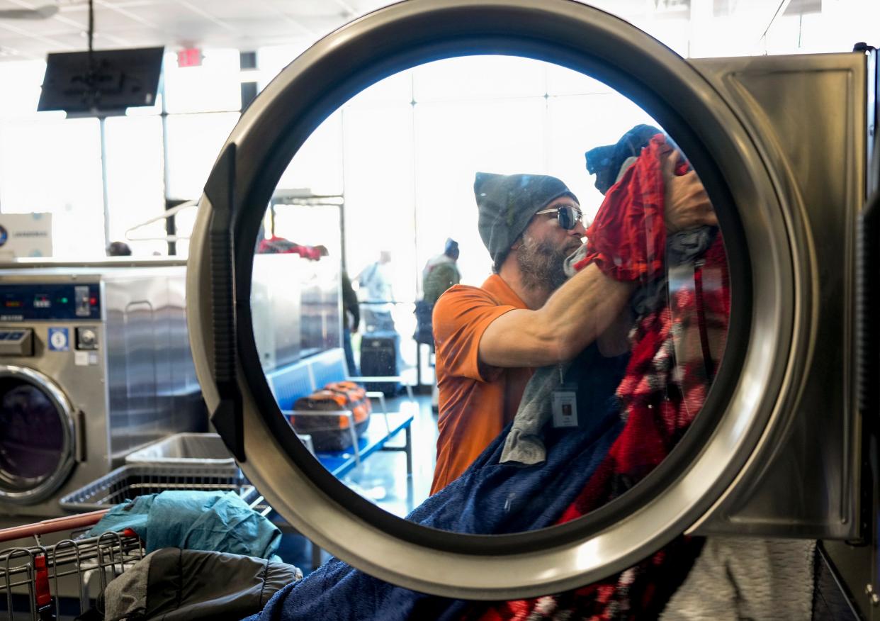 Benton Buratti does his laundry Monday at the Clean Laundry laundromat on West Parmer Lane. The nonprofit Maximizing Hope has held free weekly laundry events the past nine months at the laundromat for people experiencing homelessness.